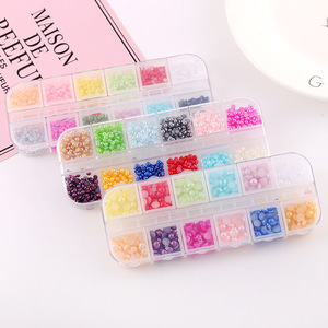 Lot de 12 grilles de perles pour nail art, perles plates rondes colorées, accessoires DIY pour décorations de manucure - Product Image 1