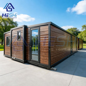 Casa Contenedor Moderna HESHi, Rectangular, Prefabricada, con Puerta de Vidrio y Diseño de Paneles de Madera para Uso en Exteriores - Product Image 1
