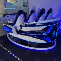 Vr carnaval jeux montagnes russes 9D Vr 4 sièges chaise de cinéma Capsule 9D équipement de réalité virtuelle 9D Machine de jeu