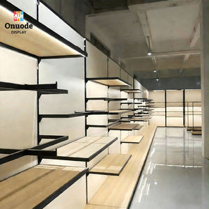 Modern Stainless Steel Clothing <b>Display</b> Racks | <b>Wall</b>-Mounted & Island Garment <b>Cabinets</b> | Custom Boutique Retail Fixtures - Product Image 4