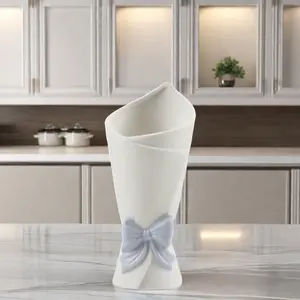 Jarrón de porcelana de diseño moderno para decoración del hogar, patrón de flores con lazo, esmalte opaco mate, hoteles, uso diario, Material cerámico