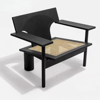 Fauteuil d'appoint moderne en bois massif noir personnalisable, assise en rotin tressé à la main, accoudoirs géométriques, pour salon, hôtel, loisirs