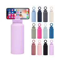 Bouteilles à vide à double paroi de 1L 32oz personnalisées bouteille d'eau isolée en acier inoxydable bouteille d'eau MagSafe magnétique avec support pour téléphone