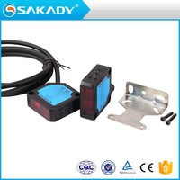 Capteur photoélectrique infrarouge à faisceau traversant SAKADY série GL50 IP65 PNP/NPN 24VDC 12VDC Montage sur fil Interrupteur photocellule lumineux