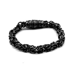 Yunnique Pulsera de cadena de serpiente con cierre magnético de acero de titanio, joyería de regalo unisex - Product Image 1