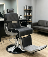 Chaise de barbier hydraulique pliable de luxe, portable, avec structure en métal, revêtement en cuir PU noir, accents chromés, inclinable, pour salon de coiffure