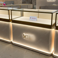 Projet clé en main de mobilier de bijouterie Sundo : Vitrine en verre sur mesure, comptoir, armoire de présentation pour magasin de bijoux, fabricant.