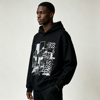 Sweat-shirt à capuche oversize noir avec imprimé graphique abstrait de ville, impression DTG Kornit, logo personnalisé disponible, pull streetwear