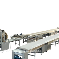 Ligne de production de barres Snickers en acier inoxydable, machine d'enrobage automatique au chocolat, homologuée CE ISO pour les usines de confiserie