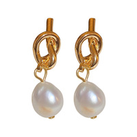 Boucles d'oreilles design haut de gamme, luxe léger, mode niche individuelle, tempérament français, perle nouée coréenne
