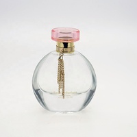 Bouteille de parfum d'épaisseur lourde de 50ml bouteille de parfum en verre ovale transparente de conception spéciale mignonne pour les femmes avec la boîte-cadeau de forme de livre