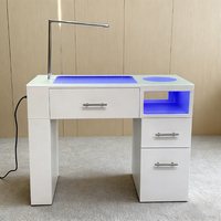 Table et chaises de manucure LED modernes et luxueuses pour techniciens de salon de beauté