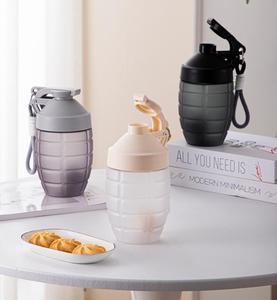Botella Mezcladora de Proteínas con Forma de <span class=keywords><strong>Granada</strong></span> de 600 ml, Vaso Mezclador Deportivo Portátil con Cuerda para Gimnasio - Product Image 1
