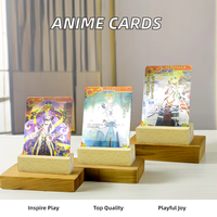 Cartes à jouer holographiques colorées Anime personnalisées boîte imprimée en papier haut de gamme avec image de dessin animé emballée dans un emballage rétractable avec échantillon de logo gratuit