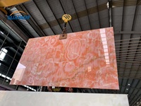 Panneaux et dalles en pierre d'onyx rose translucide rétroéclairée, pierres précieuses semi-précieuses roses pour la décoration intérieure de luxe