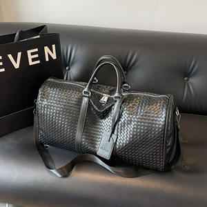 กระเป๋าเดินทางทรงดัฟเฟิลขนาดใหญ่ ดีไซน์ทันสมัย ใช้ได้ทั้งชายและหญิง  กระเป๋าถือสำหรับวันหยุดสุดสัปดาห์  วัสดุหนัง PU สีดำ กันน้ำ ทนทาน  ปิดด้วยซิป  ทันสมัย - Product Image 6