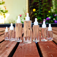 Bouteille en verre transparente 50 ml avec compte-gouttes en plastique blanc, pour utilisation des huiles essentielles