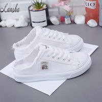 Chaussures en toile à lacets en gros, nouvelles pantoufles plates en jean blanc pour femmes, collection printemps-été 2025
