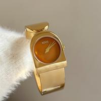 Montre Femme Quartz Rétro Luxe Léger, Montre Bracelet Clochette Dorée, Montre Femme Tendance Personnalité Simple et Élégante