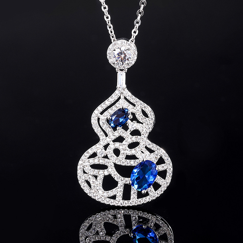 Blue pointed crystal pendant with chain