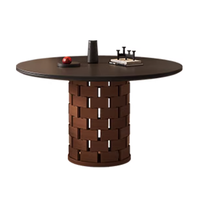Table à manger ronde en pierre frittée noire Wabi Sabi de style vintage français, noyer du milieu du siècle, écologique et durable pour appartement et hôtel
