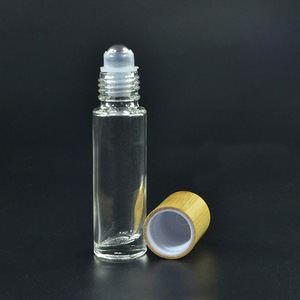 Botella de Vidrio Cilíndrica con Rodillo, Negra Mate de 10 ml con Tapa Dorada, para Uso Personal - Product Image 6