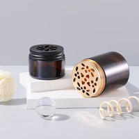 Pot diffuseur en verre ambré avec couvercle perforé en métal pour perles et baumes