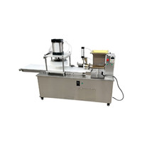 Machine commerciale de découpe et de portionnement de pâte pour la fabrication de pain pita, de gâteaux, de biscuits et de pâtisseries