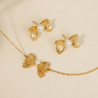 CLIORO Ensemble de bijoux élégant avec nœud texturé et perles, étanche, comprenant boucles d'oreilles, collier et bracelet, idéal pour mariage, pour femmes