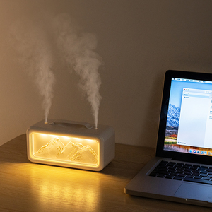 Nuevo humidificador doméstico de doble chorro con luz nocturna de montaña nevada y efecto de nieve artificial para escritorio - Product Image 1