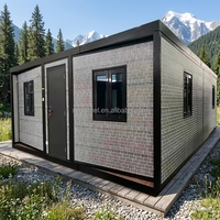 Maison conteneur de luxe pliable et extensible à deux étages et deux ailes, mobile et anti-cyclone