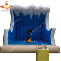 Machine de surf gonflable commerciale Sport jeu gonflable planche de surf mécanique simulateur d'équitation de surf pour la fête