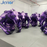 Loupes gonflables de dessin animé utilisées pour les décorations promotionnelles sur scène lors de fêtes d'anniversaire en plein air.