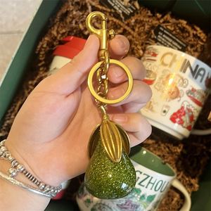 Wholesale Gilded Pear Keychain Elegant Green & Gold Pear Pendant with Triple <b>Leaves</b> Fashionable Bag Charm & Keyring Accessory - Product Image 3