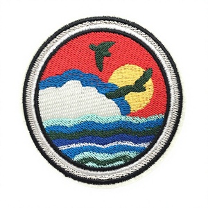 INSIGNIA BORDADA A MÁQUINA - Product Image 1