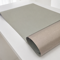 Tissu conducteur gris ultra-mince laminé avec un film adhésif thermofusible pour le blindage EMI, la mise à la terre ESD et l'enroulement des câbles