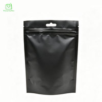 Sachets d'emballage refermables personnalisés en PE, noirs mats, avec fermeture éclair, trou Euro et logo imprimé en héliogravure pour shampoings et petits produits
