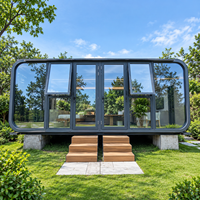 Maison capsule spatiale en structure acier préfabriquée, panneaux sandwich, idéale pour appartement, maison d'hôtes, bureau de jardin, ou pièce de jardin.