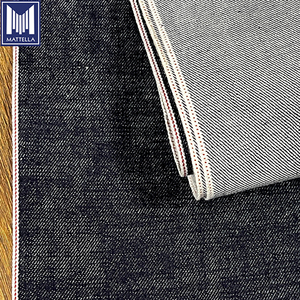 Tela vaquera japonesa selvedge personalizada al por mayor de 15 oz, 100% algodón, sin lavar, teñida en bruto, con patrón original para jeans - Product Image 1