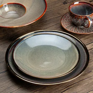 Piatti e ciotole con bordo in porcellana oro lavorati a mano Set da tavola ristorante piatti rotondi Set stoviglie in ceramica Set di stoviglie