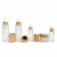 Flacon de lotion en verre écologique de 15g, 30g, 50g, 100ml, 120ml avec bouchon en bois de bambou naturel pour l'emballage de produits de beauté