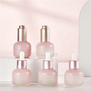 Belle bouteille en verre d'emballage cosmétique de soins de la peau rose avec pompe goutte à goutte automatique pour les cheveux <span class=keywords><strong>parfum</strong></span> essence yeux réparation sérum lotion crème - Product Image 3