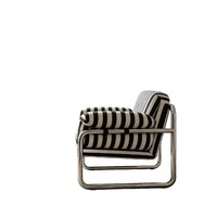 Fauteuil individuel en velours, durable, avec structure métallique et rembourrage en mousse, idéal pour hôtels et salons, design minimaliste.