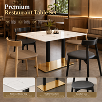 Ensemble de salle à manger, surface en pierre frittée blanche avec colonne à revêtement noir et doré, idéal pour les cafés, restaurants, zones alimentaires et salles de jeux modernes