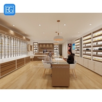 Aménagement intérieur de magasin sur mesure en matériaux recyclés, solution d'aménagement de magasin, présentoir rotatif pour lunettes