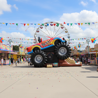 Château gonflable commercial combiné Monster Truck avec toboggan pour location événementielle