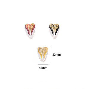 HB544 จี้รูปปีกมังกรเคลือบน้ำมันหลากสีสแตนเลสสตีลขายดีรุ่นใหม่ เครื่องประดับจี้สร้อยคอทอง 18k ดีไซน์สร้างสรรค์ อุปกรณ์ DIY - Product Image 4