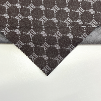 Tissu en denim jacquard noir et gris avec logo rétro en lettres pour vêtements, vestes et sacs