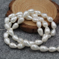 En gros blanc larme en forme de coquille naturelle perle pour collier et bracelet bijoux faits main BRICOLAGE
