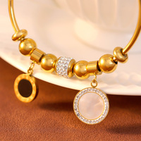 ZSZL Bracelet en acier titane plaqué or, design géométrique élégant avec coquille blanche et diamant, style simple et raffiné